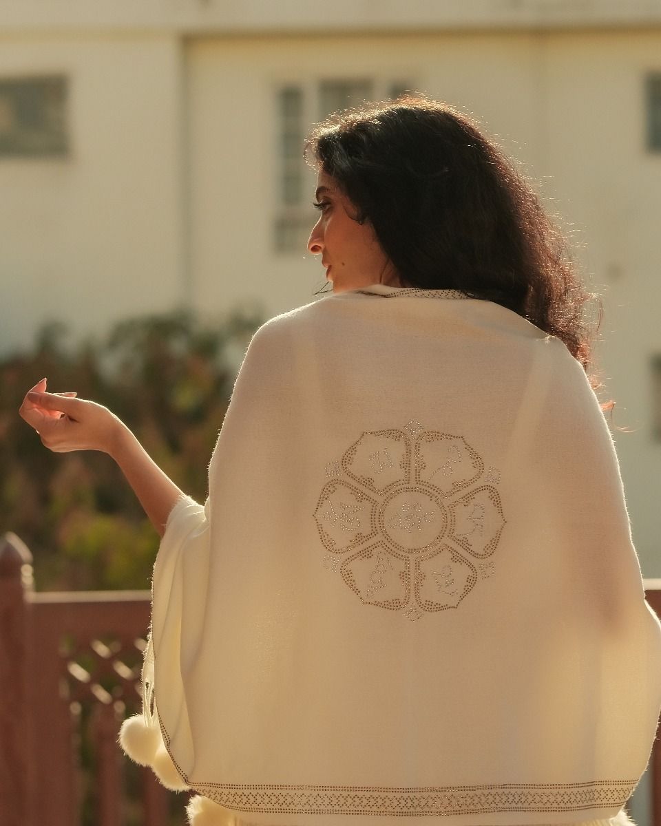 Stunnigly Beautiful Our signature Om Mani Padme Hum Ivory Pashmina Stole with Glimmering Swarovski Work. 