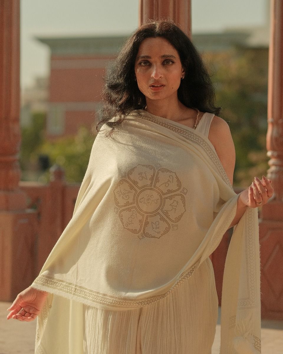 Stunnigly Beautiful Our signature Om Mani Padme Hum Ivory Cashmere Stole with Glimmering Swarovski Work. 