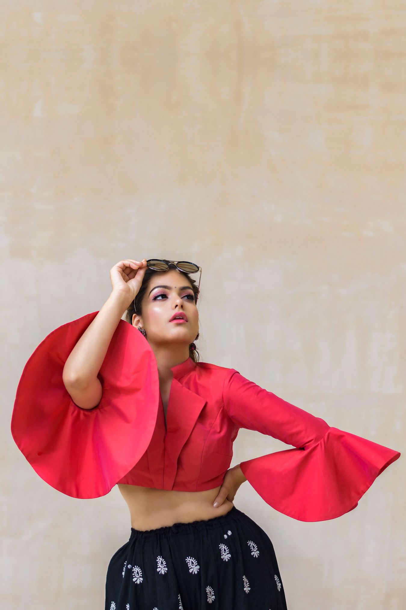 Punch Pink Bell Sleeved Crop Top Paired with Steezy Black Handcrafted Chikan Kalidaar Palazzo.