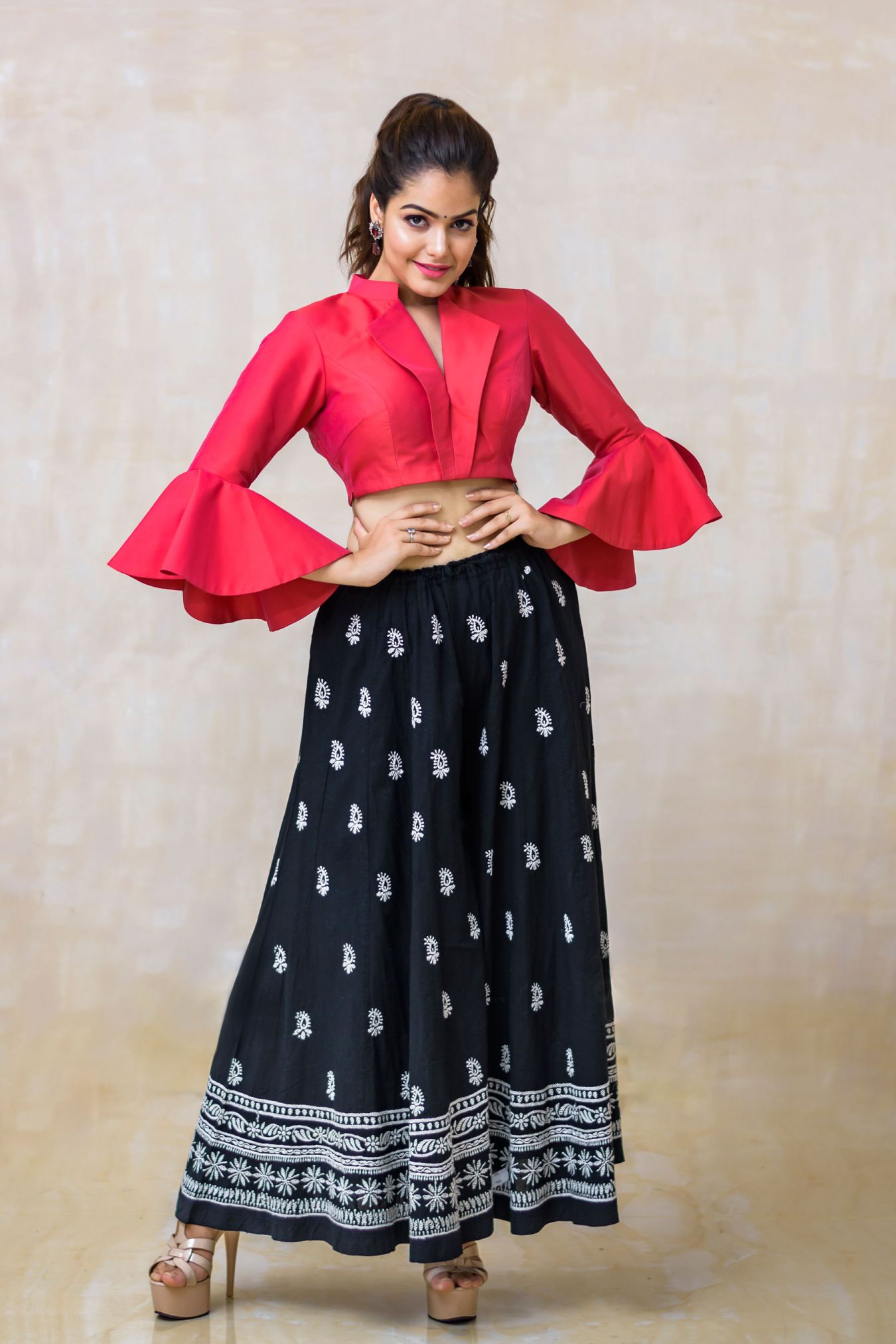 Punch Pink Bell Sleeved Crop Top Paired with Steezy Black Handcrafted Chikan Kalidaar Palazzo.