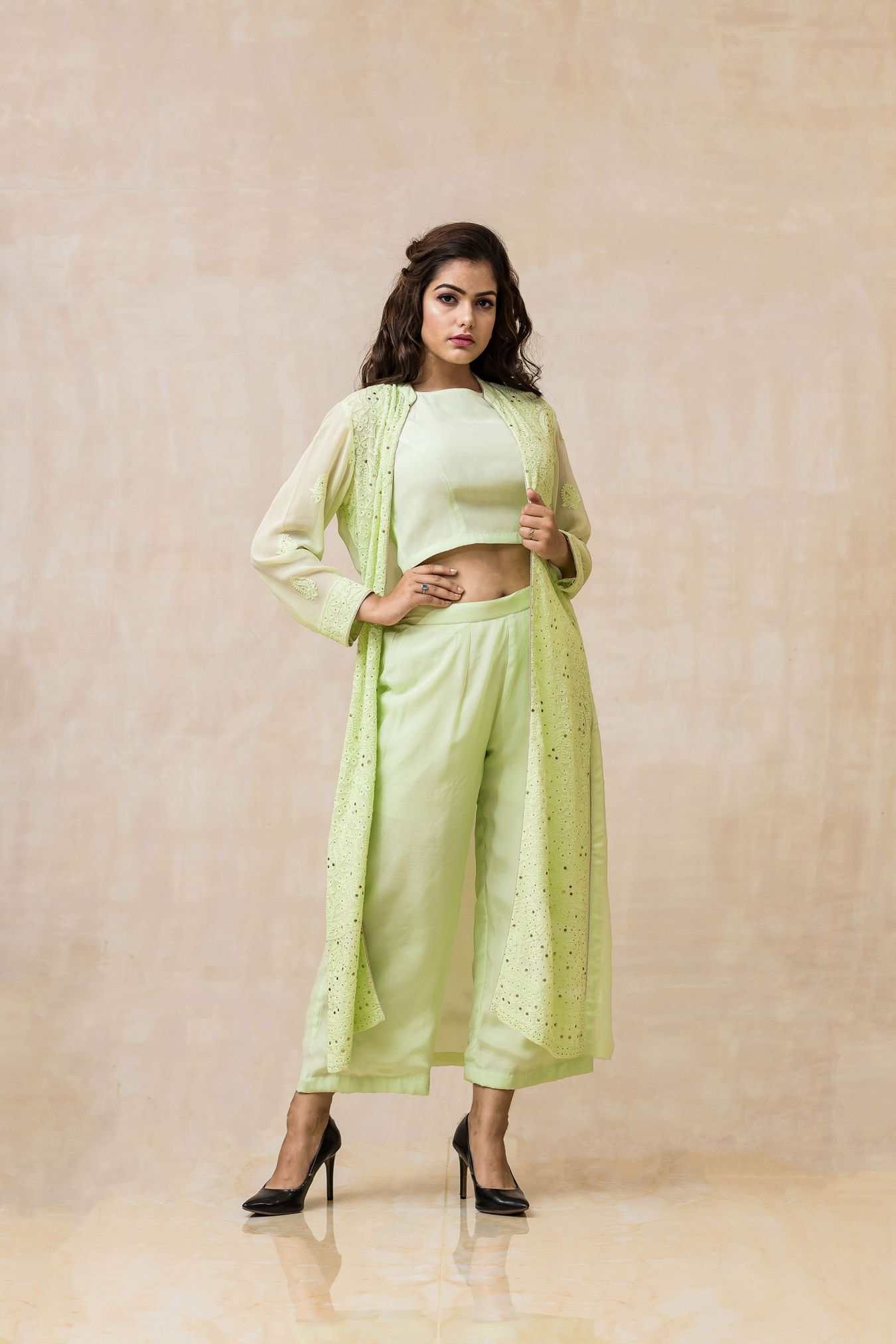 Schmick Handcrafted Chikankari Jacket Paired with Crop Top & Palazzo in Fresh Hue of Pista Green Color.