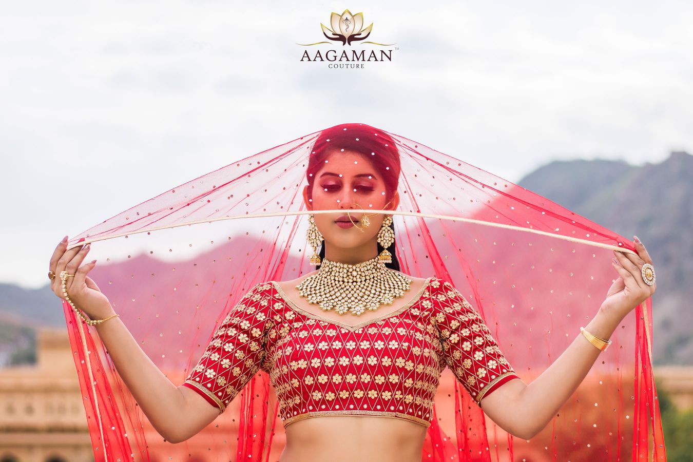 Exquisite Bridal Ghagra Choli In Bold Red with Striking Metallic Gold & Handcrafted Chikan Embroidery