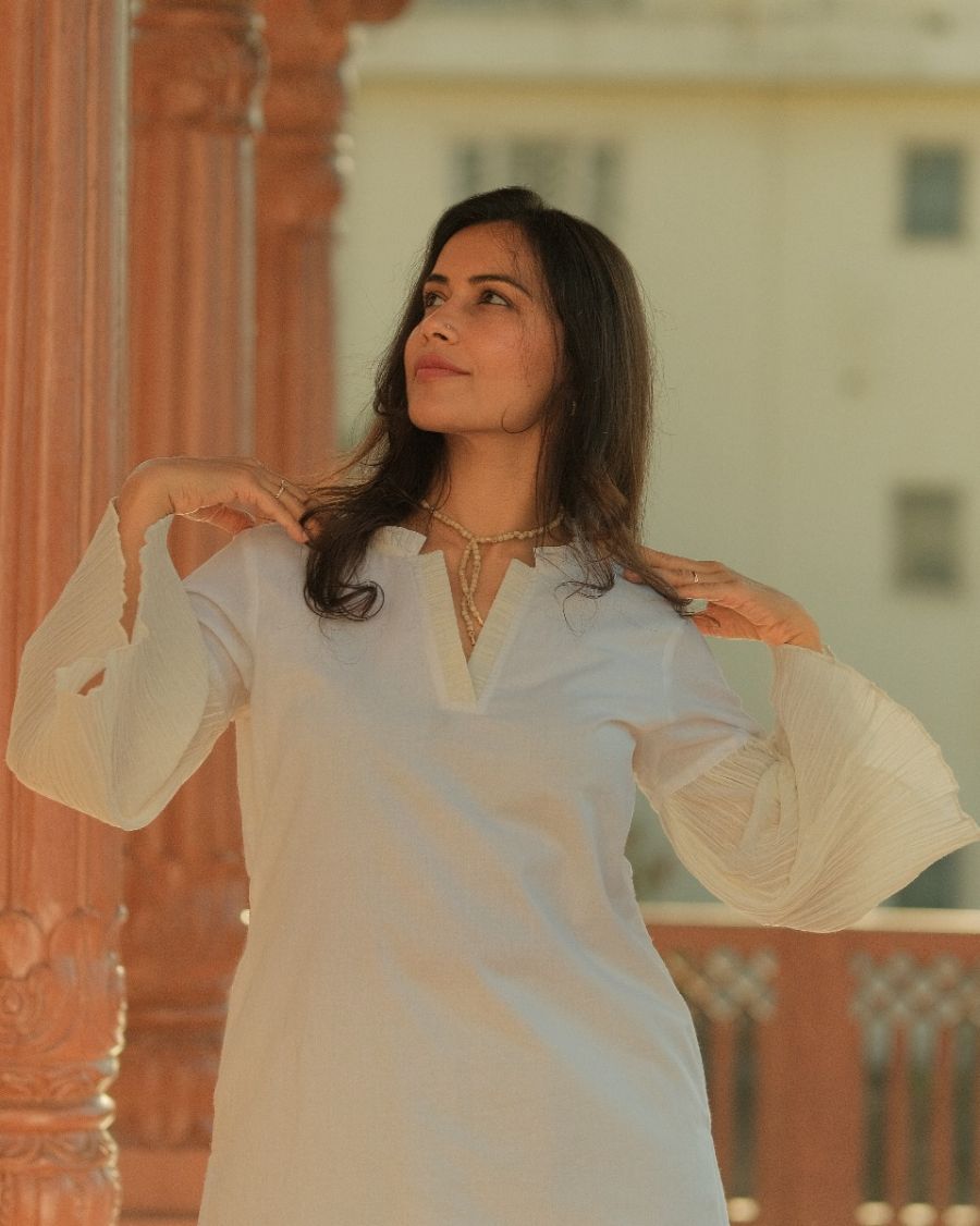 White Sophisticated Kurta Pants with crush detailings, Gracefully falling on the hands. .