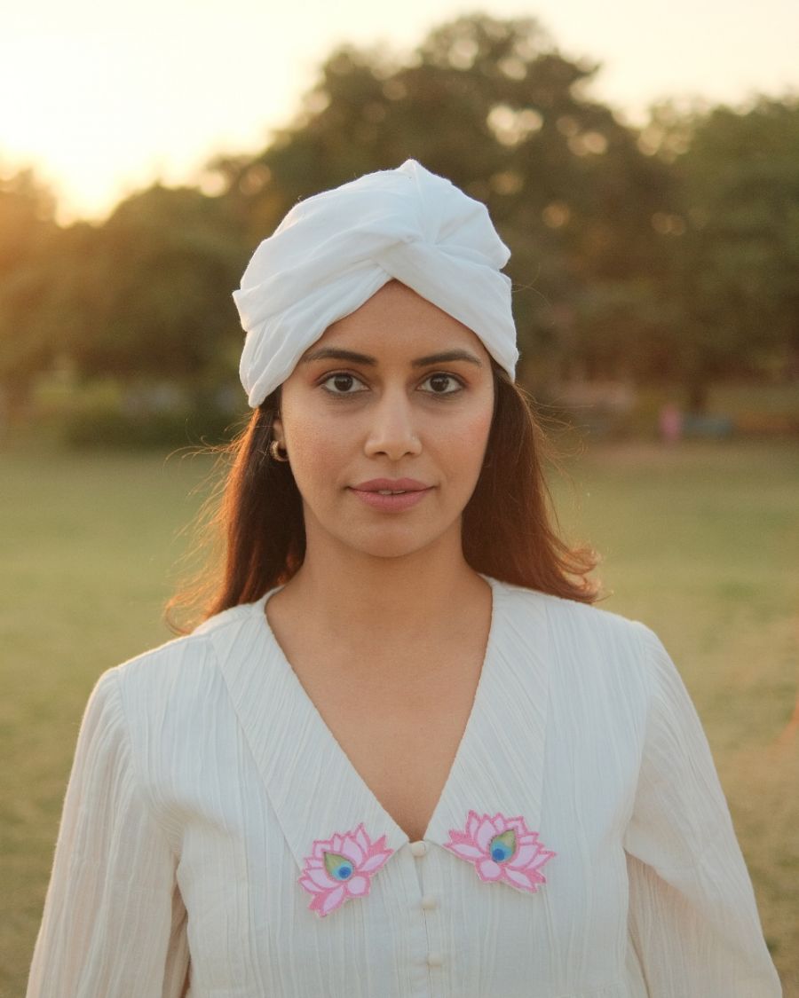 Flamboyant Circular Paneled Tier Angel Gown in Radiant White with Our Delightful Handpainted & Embroidered Signature Lotuses.